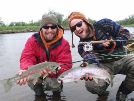 These two happy anglers each landed nice rainbow trout