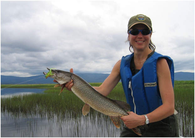 This happy angler landed a medium sized pike.