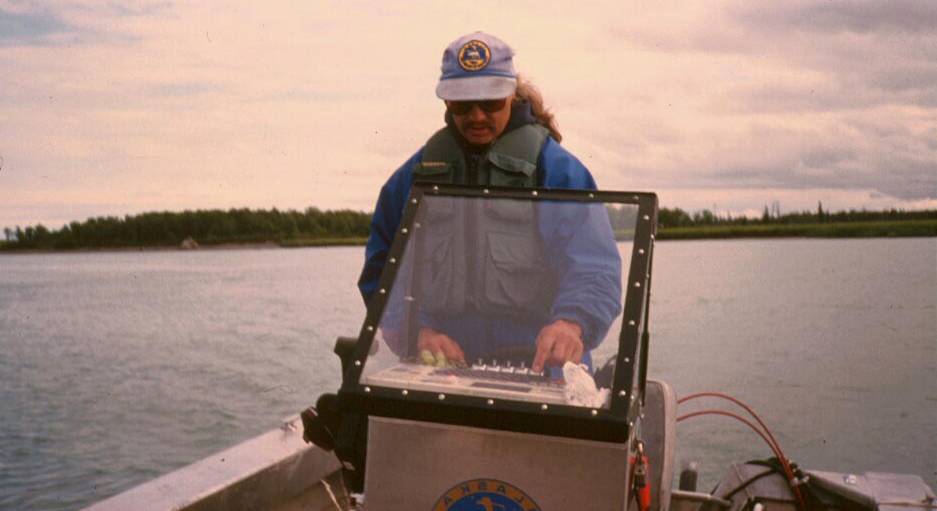 An ADF&G technician counts anglers sport fishing for king salmon