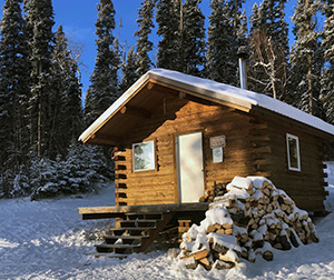 View of the cabin in winter.
