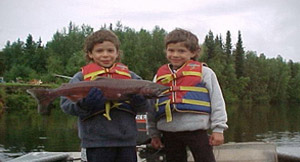 Two kids with their catch