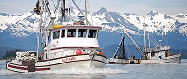 commercial fishing vessel underway in Alaskan waters