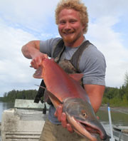 Photo of Ian Hackett with salmon