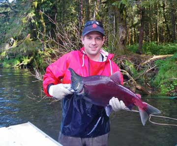 Photo of James Osga with salmon