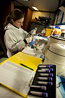 A woman doing research in a laboratory