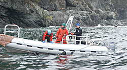 photo of a boat deploying divers