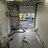Fish are pumped through large hoses from inside the hatchery to the stocking trucks.