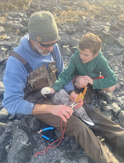 ADFG Biologist Michael Guttery with local volunteer Welsey Link