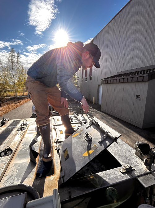 Fairbanks staff loading stocking trucks