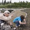 Technician must sometimes repair the beach seine net.