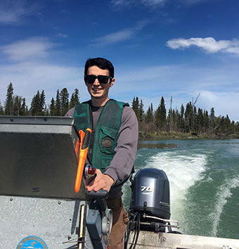 An ADF&G technician counts anglers sport fishing for king salmon