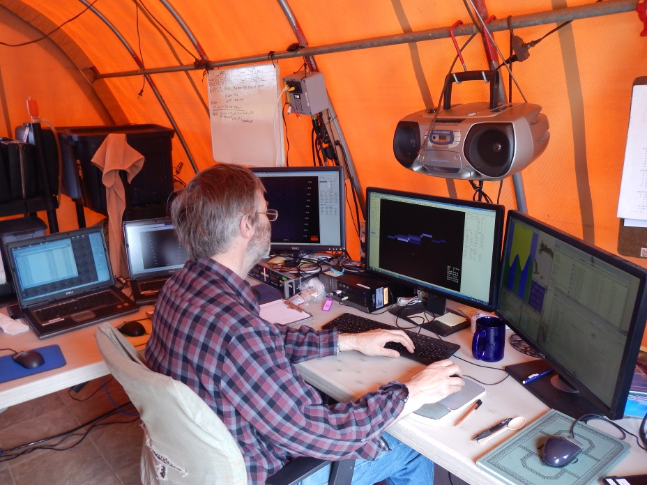 A technician uses computer software to track, count, and measure fish passing the river mile 13.7 sonar site