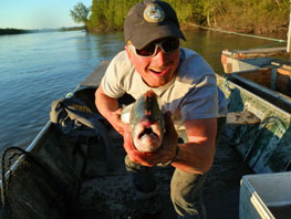 Photo of Ian Hackett with salmon