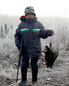 young hunter with his harvest