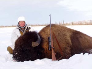 Photo of a successful bison hunter