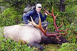 Photo of a successful Elk hunter.