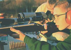 Photo of a person sighting-in their rifle.