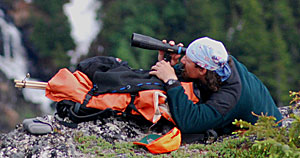 Photo of a man scouting for game