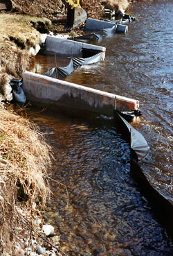 Jersey barriers and silt fence on Willow Creek