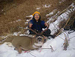 Hunter with deer